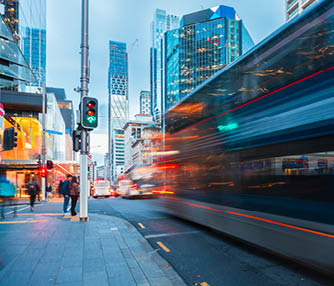 Rush hour in down town Auckland City at the corner of Queen street and Custom street, Auckland, New Zealand.