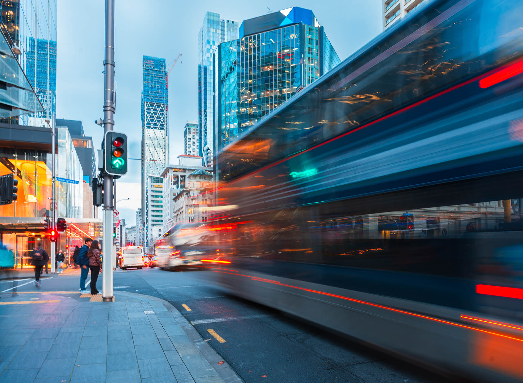 Rush hour in down town Auckland City at the corner of Queen street and Custom street, Auckland, New Zealand.